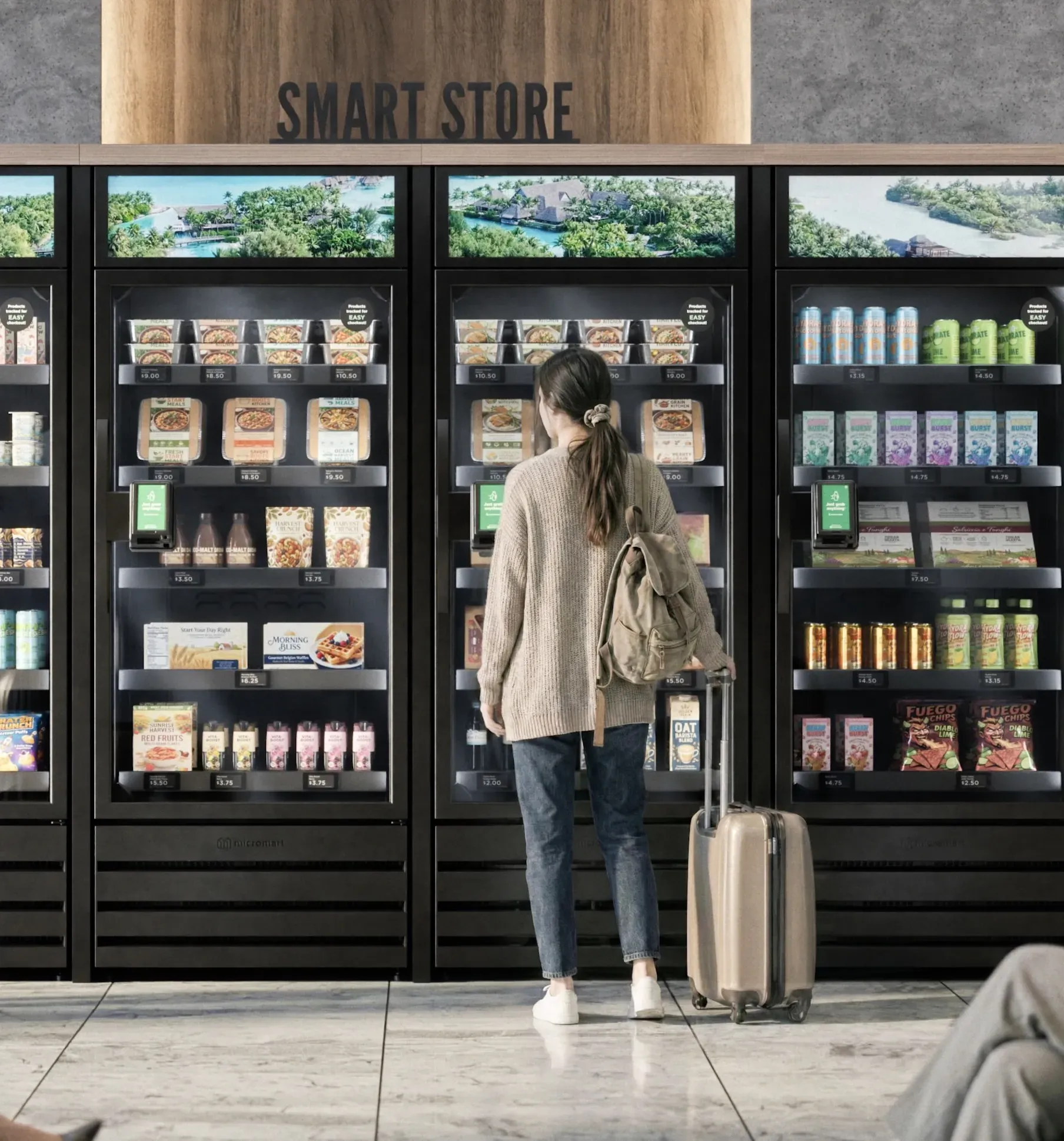 A traveler with a suitcase shopping at a multi-unit smart store